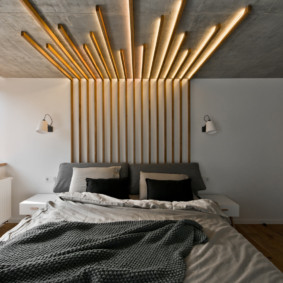 sconce in the bedroom over the bed photo