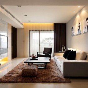 Bright living room in the style of minimalism.
