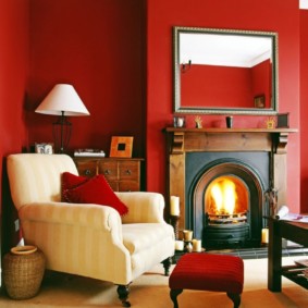 Rectangular mirror on a burgundy wall