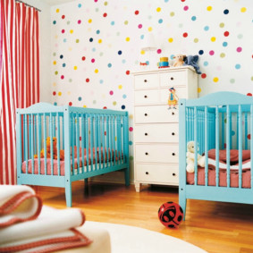 Cots for babies in a nursery for two