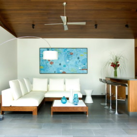 White furniture in a room with a wooden ceiling