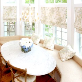Oval table in the bay window of a private house