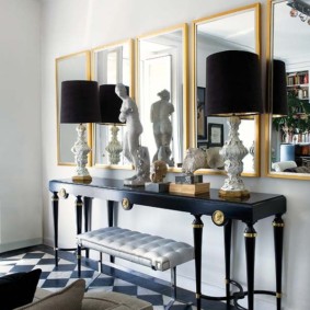 Stylish floor lamps on a black table