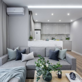 Lighting of the apartment with light gray walls