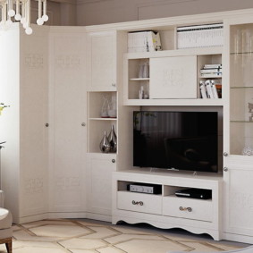 White wardrobe in a set of furniture for the hall