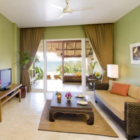 living room in green photo design
