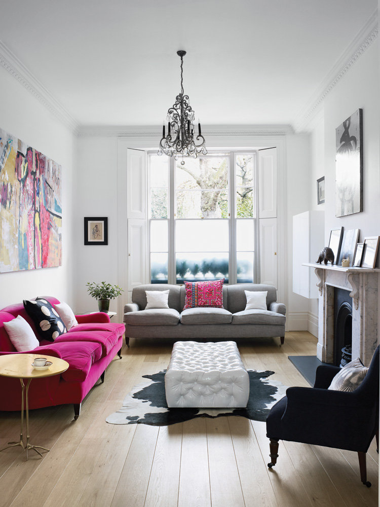 Pink sofa in a white living room