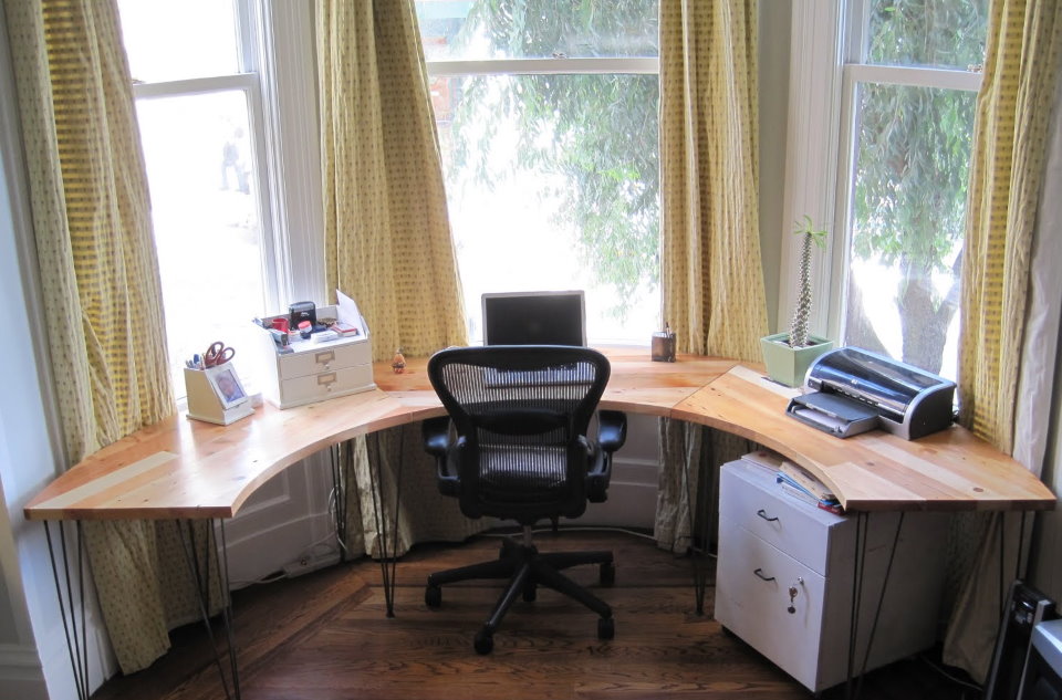 Workplace in the living room bay window