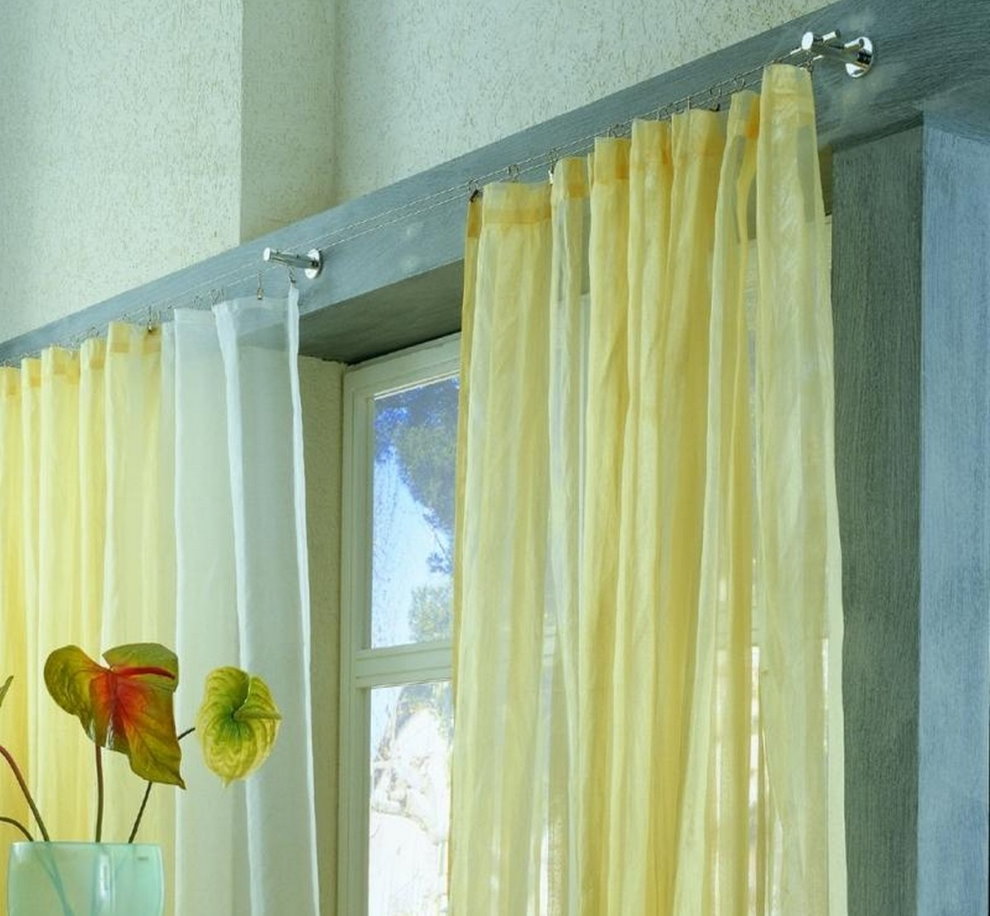Yellow tulle on a string cornice