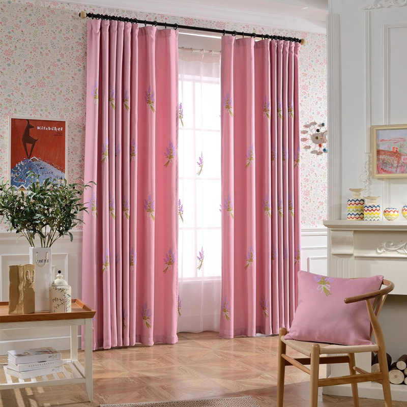 pink satin curtains on a black cornice