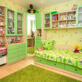 Green rug in a children's room