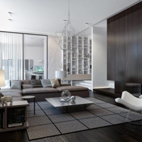 Pelēks paklājs moderna stila viesistabā