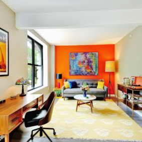 Bright orange wall in a rectangular room
