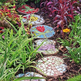 Home-made path from fragments of ceramic tiles