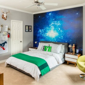 Green bedspread on a white bed