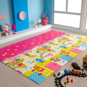 Cartoon characters on the carpet in the children's bedroom