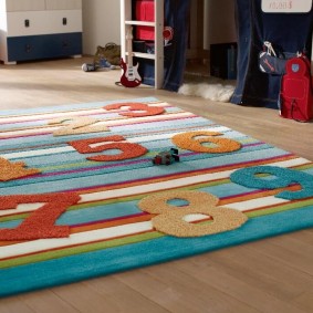 Children's rug with sewn numbers