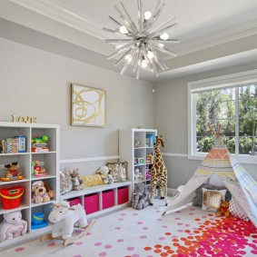 Playhouse on the carpet in the nursery