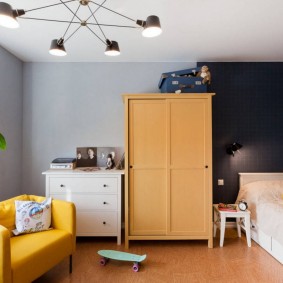 Dark blue wallpaper in the children's bedroom
