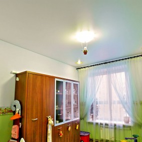 Tulle curtains on the window of a children's room