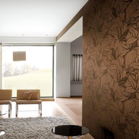 Floral ornament on brown wallpaper