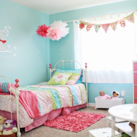 Pink textile in a turquoise room
