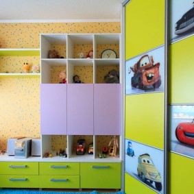 Bright stickers with cars on the closet in the nursery