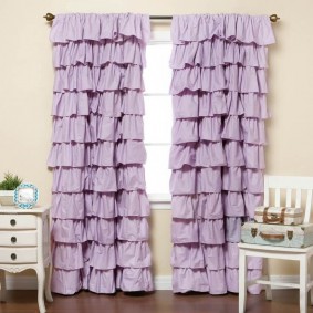 Light curtains with pleats on the children's window