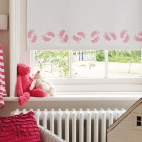 Pink print on a roller blind