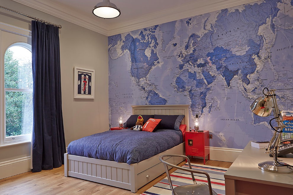 World map on photo wallpaper in a boy’s bedroom