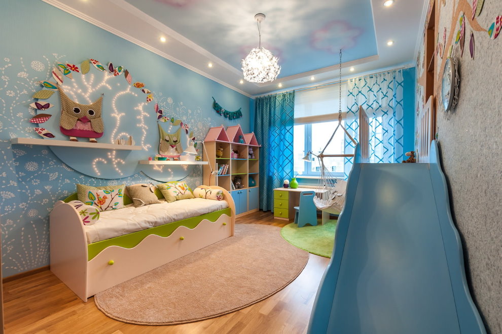 Children's slide in a room with a stretch ceiling