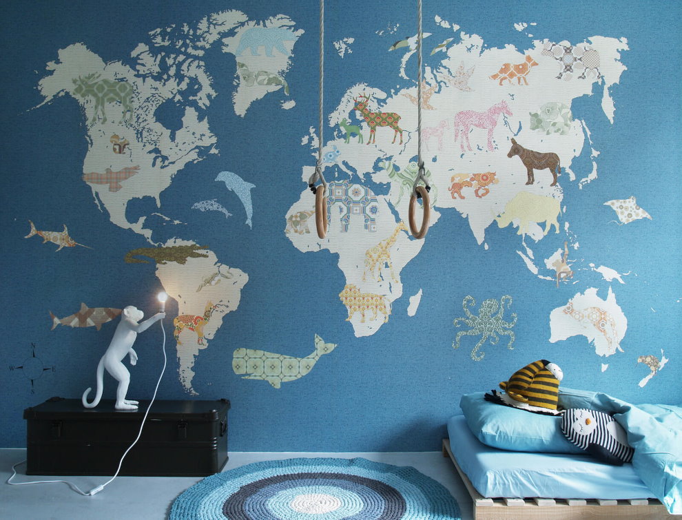 World map on a nursery wall for a boy