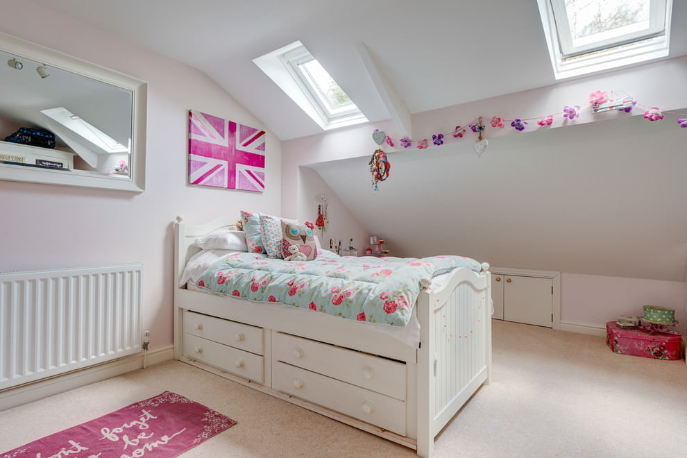White bed with drawers for storage of children's things