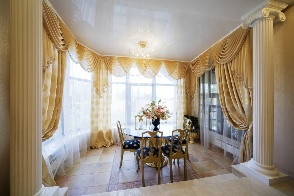 Beige curtains with pelmet in a classic style room