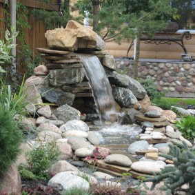 Small waterfall made of natural stones