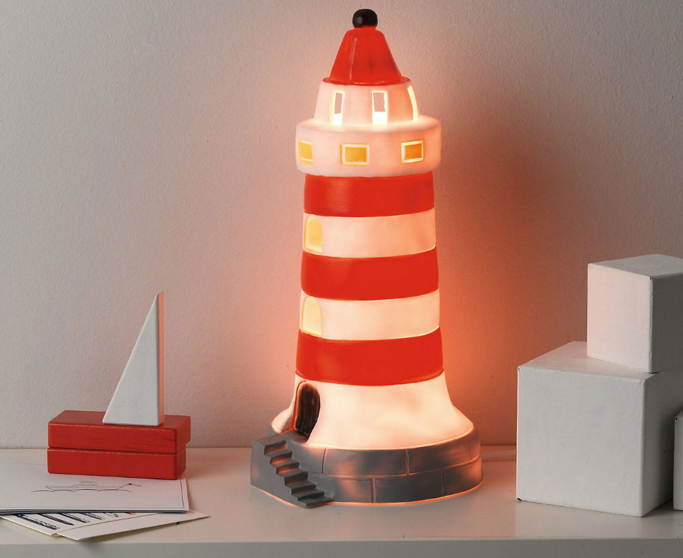 Night lighthouse on the bedside table