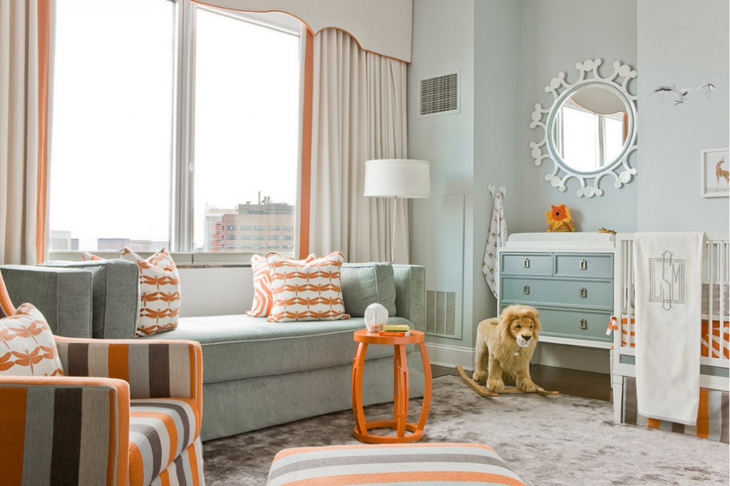 Orange accents in a white and blue children’s room