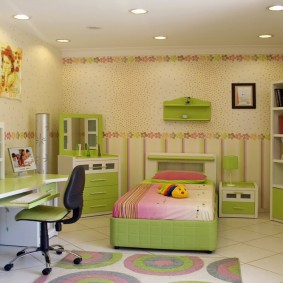 Green furniture in a children's room