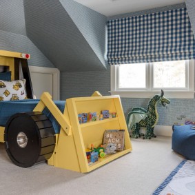 Dětská postel ve formě buldozeru