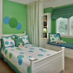 Green curtains in a nursery