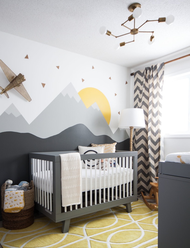 Modern chandelier in the room for the baby