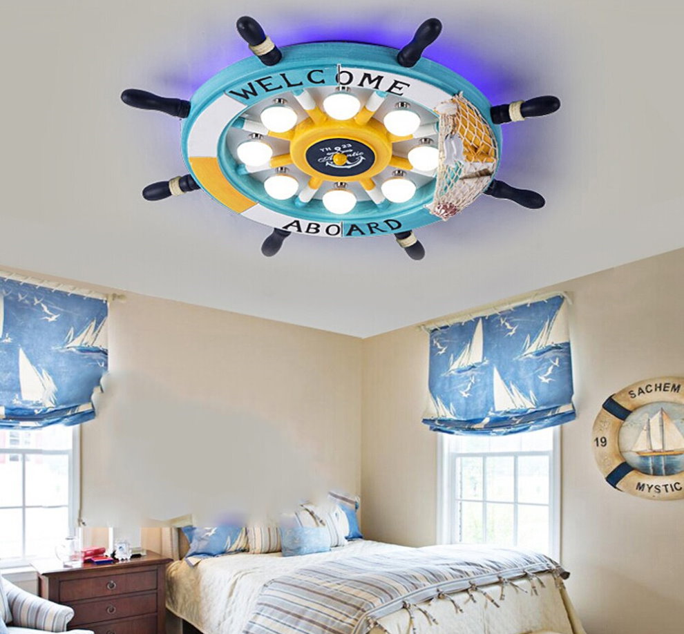 Themed lamp on the ceiling of the room for a boy