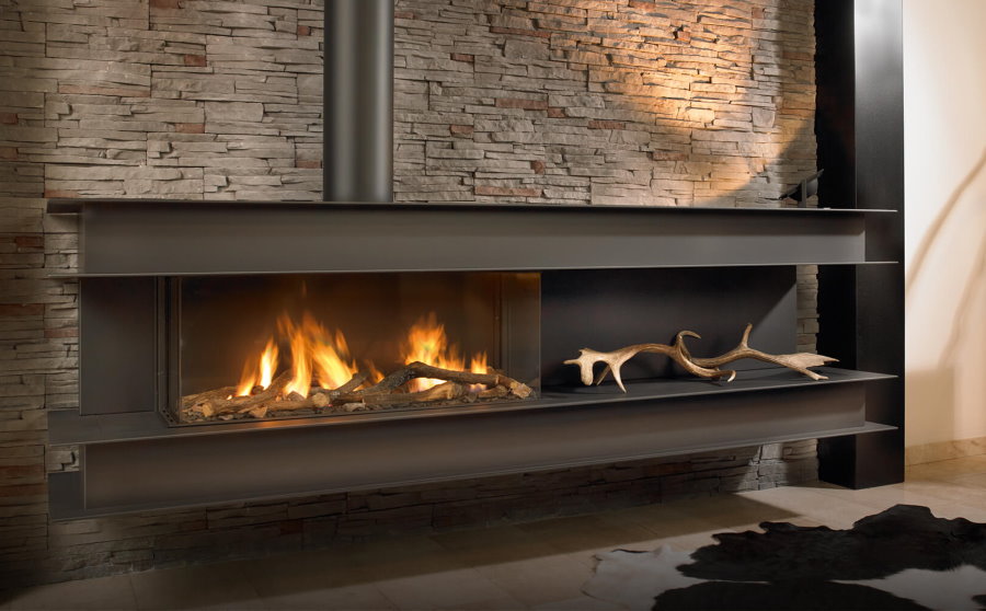 Metal bio fireplace in the living room loft style