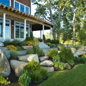 Rock Garden in front of a two-story house