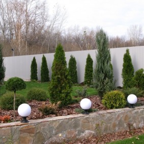 Spherical lamps on a stone base
