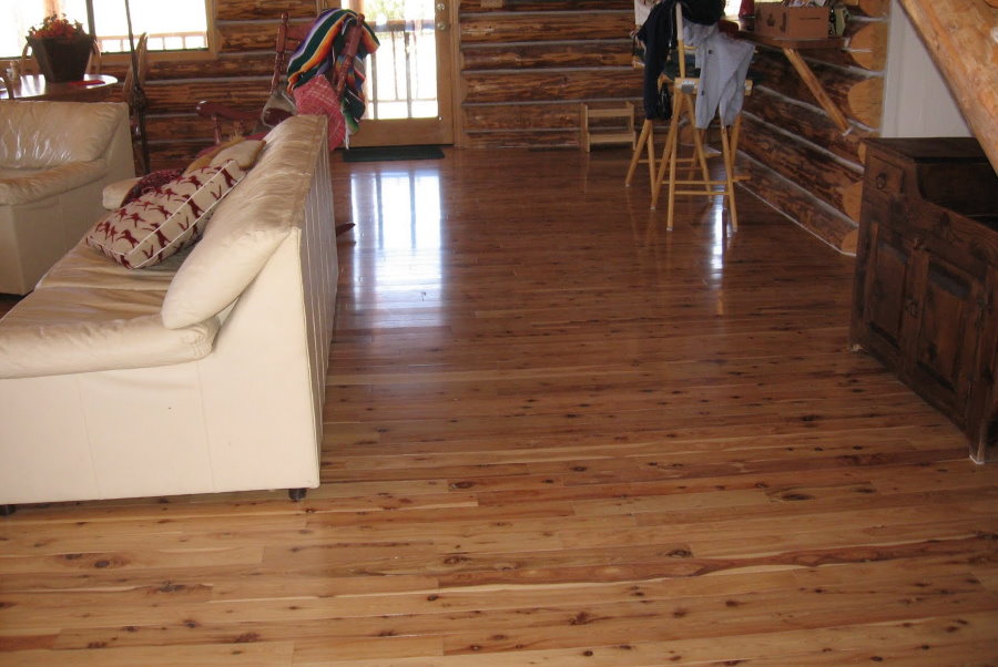 Lacquered boards on the floor of a wooden house