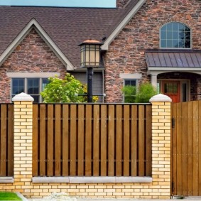 wooden fence for the plot review photo