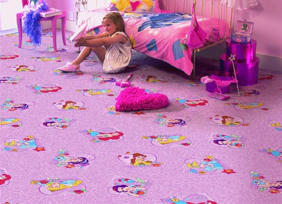 Little girl on the carpet in a pleasant color