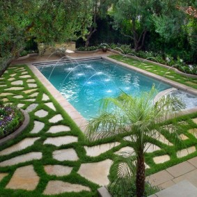 Rectangular pool with decorative fountains