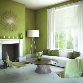 White floor lamp on a background of green walls